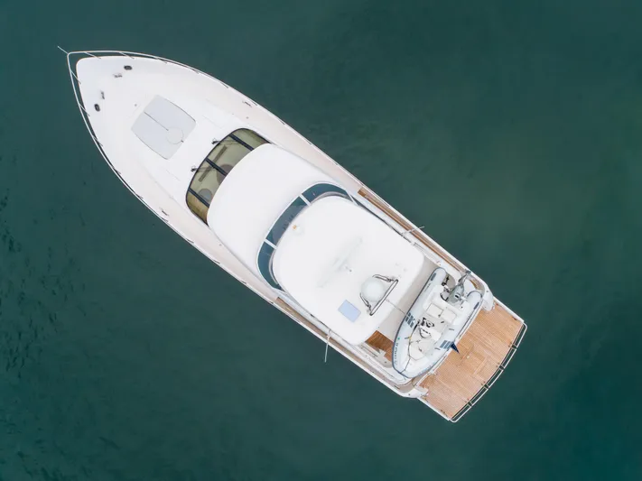 Oceana Yacht Photos Pics Aerial view of 2009 McKinna 60 Pilothouse yacht on calm water.