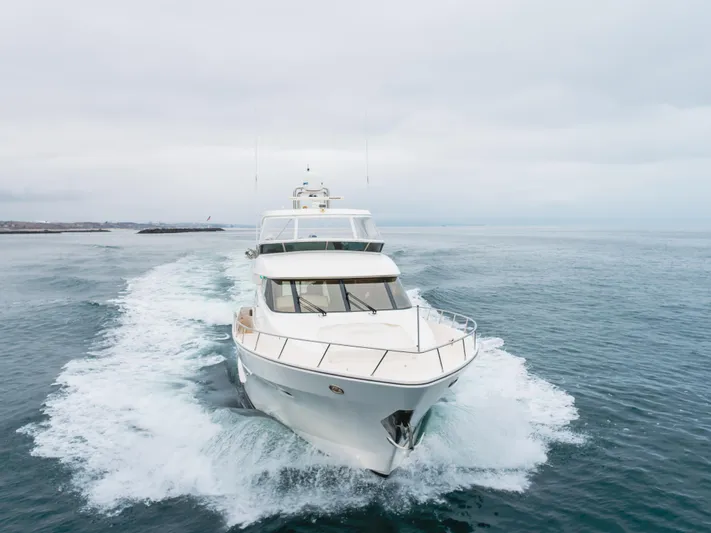 Oceana Yacht Photos Pics 2009 McKinna 60 Pilothouse yacht cruising on open water.