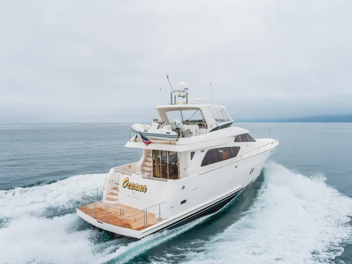 Oceana Yacht Photos Pics 2009 McKinna 60 Pilothouse yacht cruising on open water.