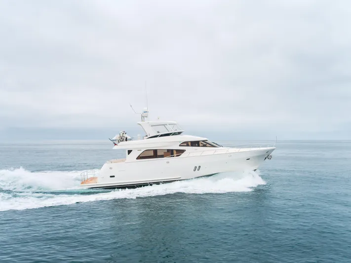 Oceana Yacht Photos Pics 2009 McKinna 60 Pilothouse yacht cruising on open water.