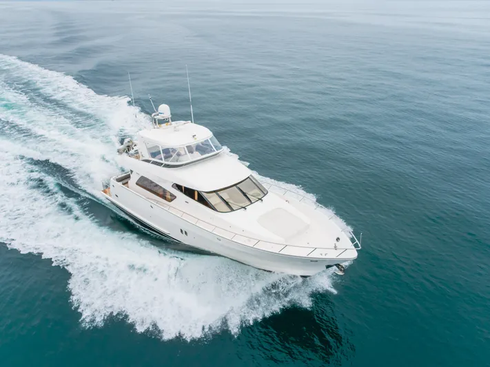 Oceana Yacht Photos Pics 2009 McKinna 60 Pilothouse yacht cruising on open water.