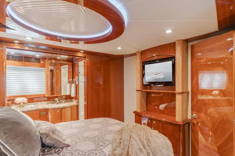 Oceana Yacht Photos Pics Luxurious 2009 McKinna 60 Pilothouse yacht interior with elegant wood finishes and modern amenities.