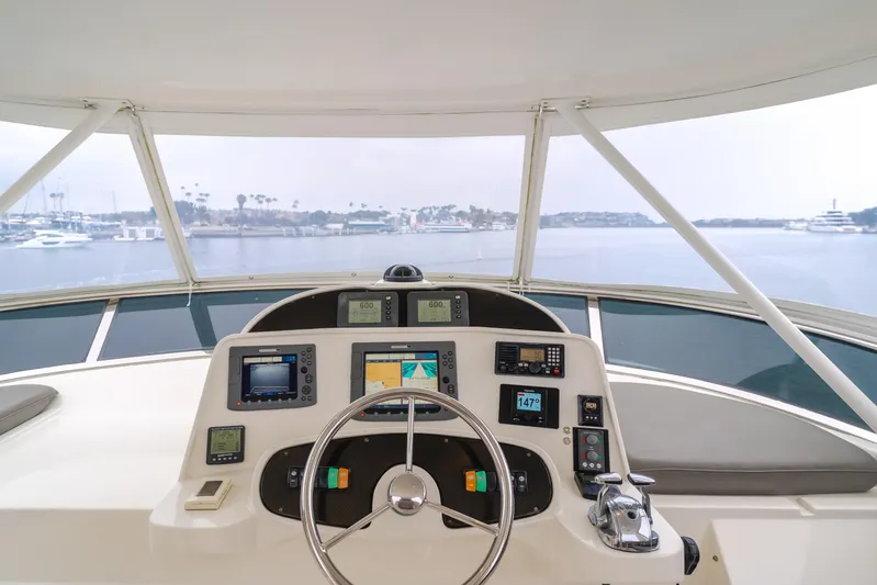 Oceana Yacht Photos Pics Pilothouse of 2009 McKinna 60 yacht with navigation equipment and ocean view.
