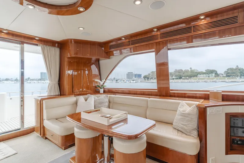Oceana Yacht Photos Pics Luxurious interior of 2009 McKinna 60 Pilothouse yacht with elegant seating and scenic views.