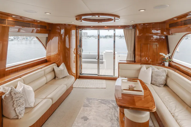 Oceana Yacht Photos Pics Luxurious interior of 2009 McKinna 60 Pilothouse yacht with elegant seating and panoramic views.