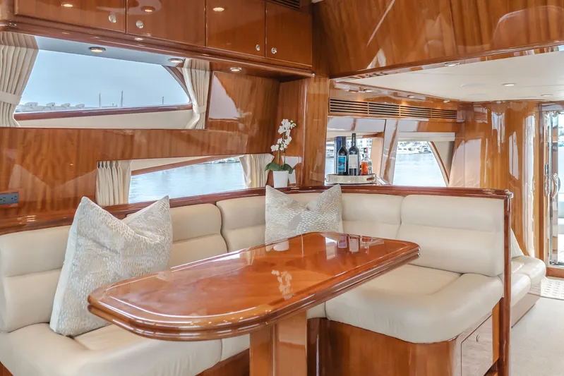 Oceana Yacht Photos Pics Luxurious interior of 2009 McKinna 60 Pilothouse yacht with elegant wood finishes.