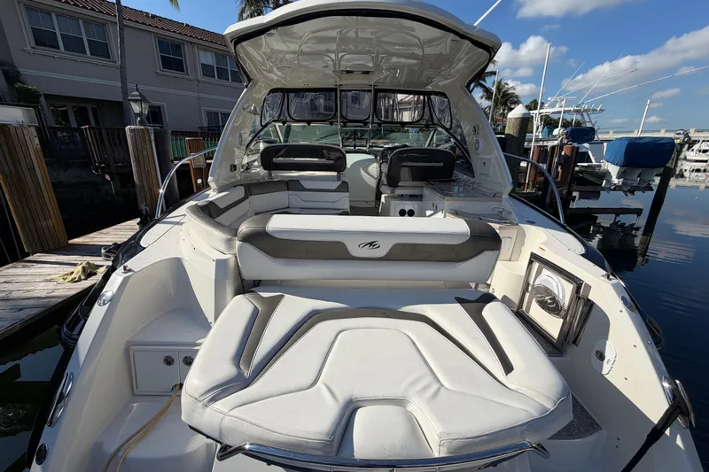 Dorita Yacht Photos Pics 2012 Monterey 400 Sport Yacht with spacious seating at a marina dock.