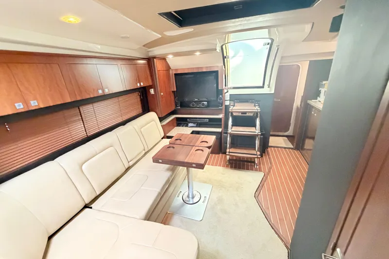 Dorita Yacht Photos Pics Luxurious interior of 2012 Monterey 400 Sport Yacht with plush seating and entertainment area.