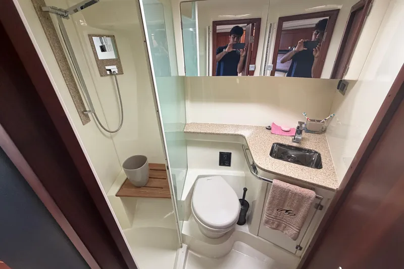 Dorita Yacht Photos Pics Bathroom interior of 2012 Monterey 400 Sport Yacht with shower and sink.