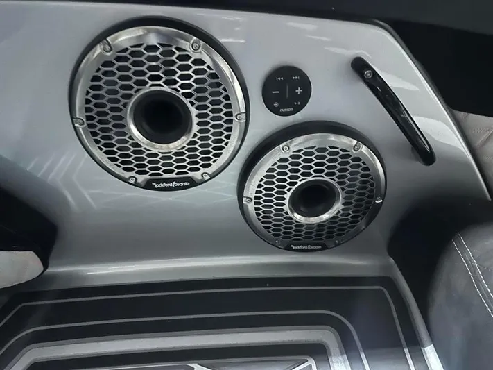  Yacht Photos Pics Interior speakers of 2018 MTI 340X boat with sleek design and controls.