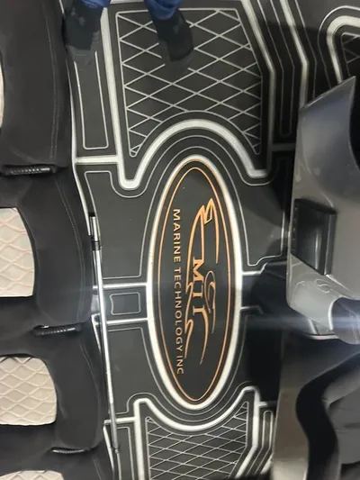  Yacht Photos Pics MTI 340X 2018 boat interior with Marine Technology Inc logo on floor mat.