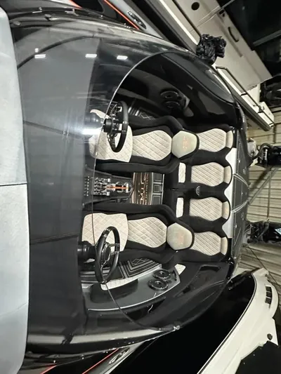  Yacht Photos Pics 2018 MTI 340X boat interior with sleek design and modern seating arrangement.