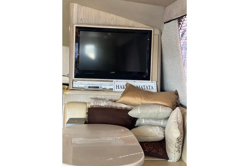 Top Pryority Yacht Photos Pics Interior of 1996 Ocean Yachts 48 Super Sport with TV and decorative pillows.
