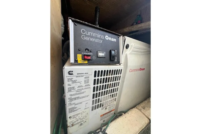 Top Pryority Yacht Photos Pics Cummins Onan generator in a 1996 Ocean Yachts 48 Super Sport boat.