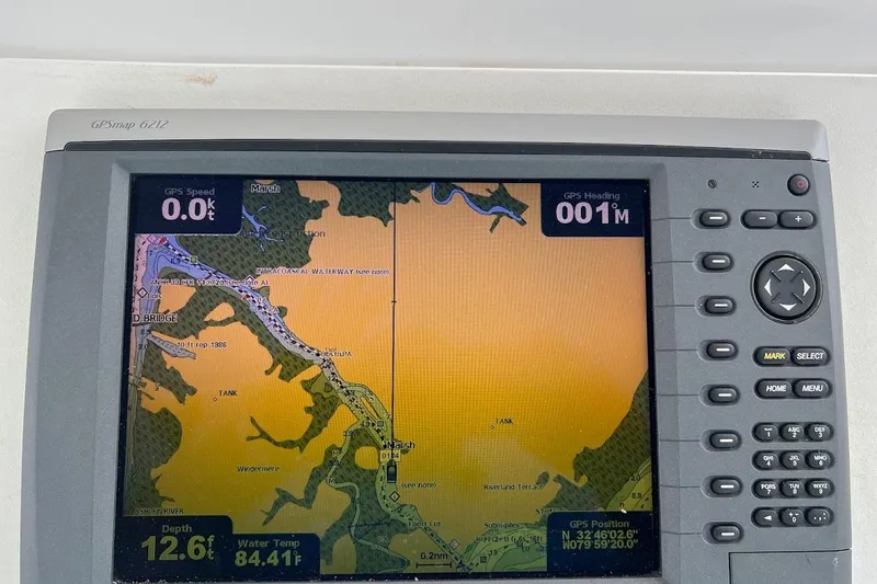 Top Pryority Yacht Photos Pics GPS navigation screen on a 1996 Ocean Yachts 48 Super Sport, displaying map and coordinates.