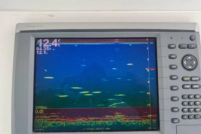 Top Pryority Yacht Photos Pics Fishfinder display on 1996 Ocean Yachts 48 Super Sport, showing depth and water temperature.