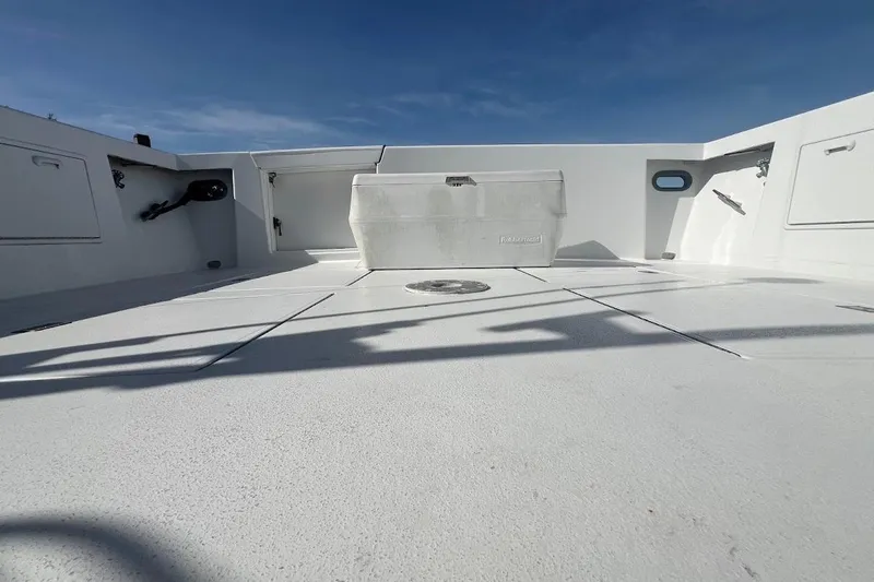 Top Pryority Yacht Photos Pics 1996 Ocean Yachts 48 Super Sport deck, spacious and clean under a clear blue sky.