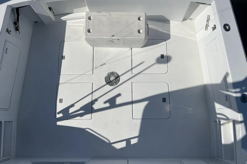 Top Pryority Yacht Photos Pics 1996 Ocean Yachts 48 Super Sport deck with storage hatches and cooler.