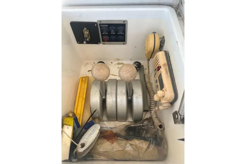 Top Pryority Yacht Photos Pics Control panel and equipment inside a 1996 Ocean Yachts 48 Super Sport boat.