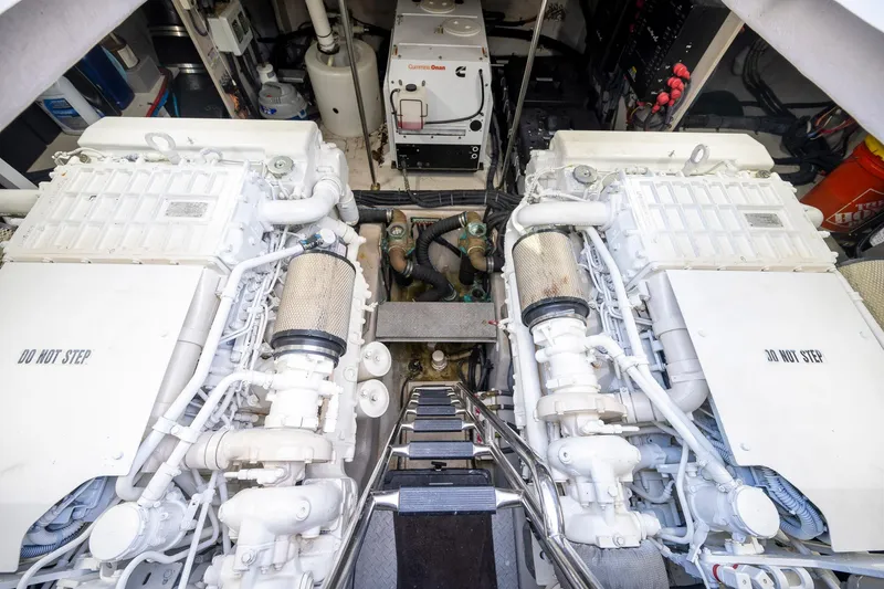 At's Ahmibote V Yacht Photos Pics Engine room of 2011 Sea Ray 580 Sundancer with twin engines and generator.