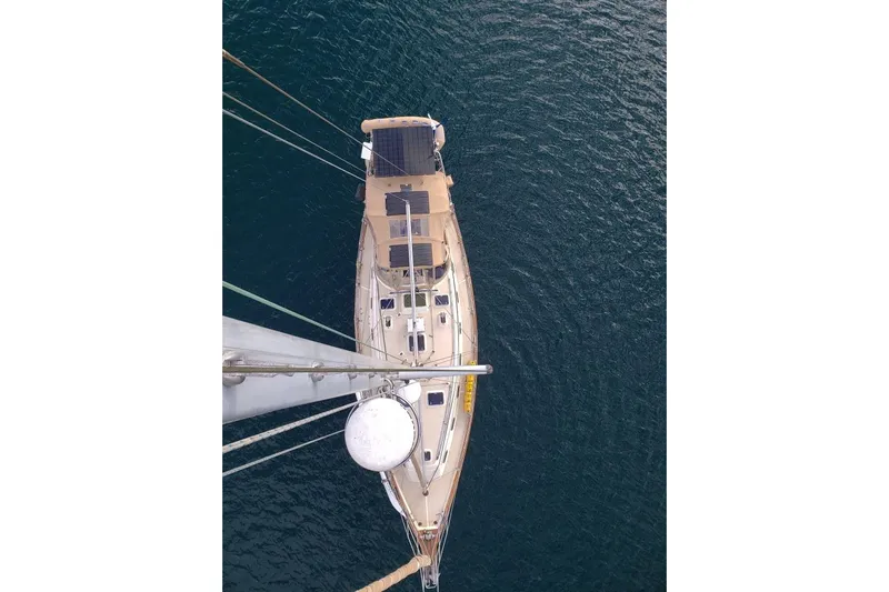 Catharpin Blue Yacht Photos Pics Aerial view of 1984 Island Packet 420 sailboat on calm water.