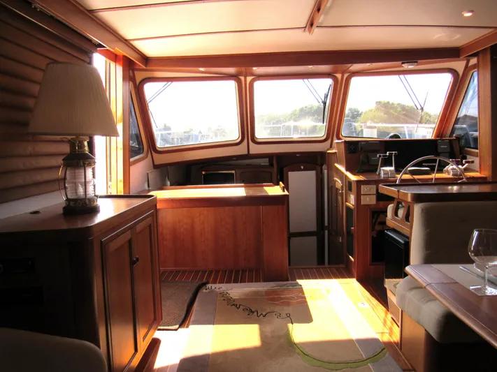 Candy O Yacht Photos Pics Interior of 1999 Sabre Sabreline 47 yacht with wood finish and natural light.