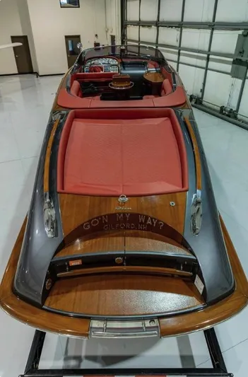  Yacht Photos Pics 2013 Riva Aquariva 33 luxury boat with red seating, displayed indoors.