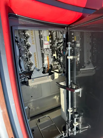  Yacht Photos Pics Engine compartment of a 2013 Riva Aquariva 33, showcasing Yanmar engines.