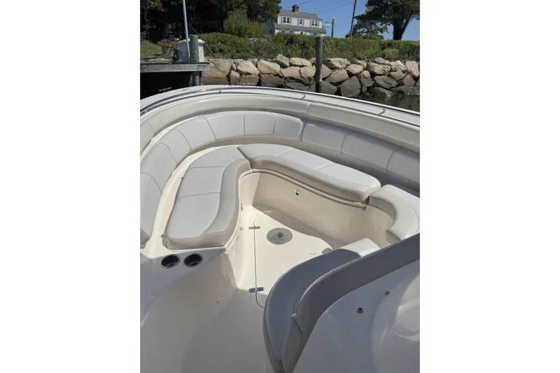  Yacht Photos Pics 2014 Pursuit ST 310 Sport boat with spacious seating and cup holders.