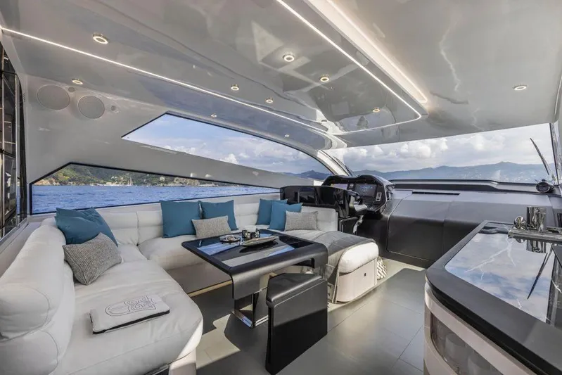  Yacht Photos Pics Luxurious interior of 2021 Otam 70 yacht with modern seating and panoramic views.