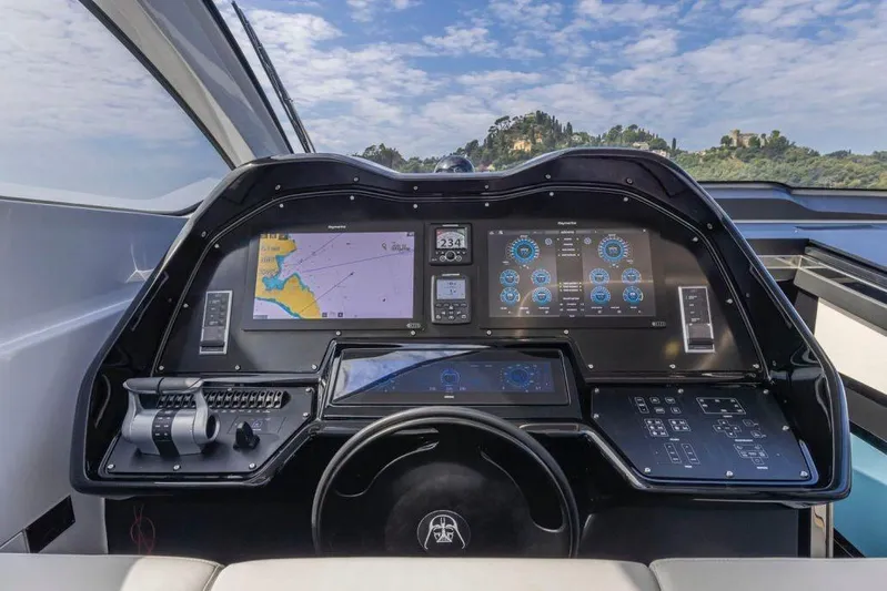  Yacht Photos Pics Cockpit of 2021 Otam 70 yacht with advanced navigation and control systems.