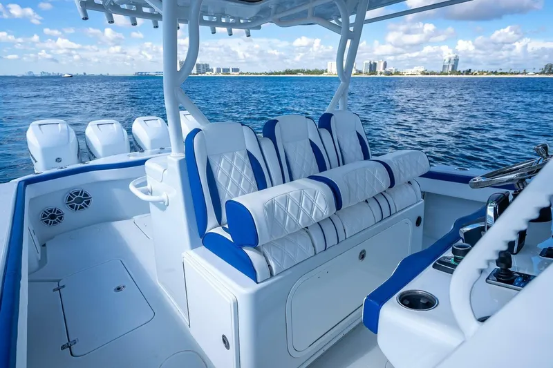  Yacht Photos Pics 2023 Yellowfin 39 Offshore boat interior with luxurious seating and ocean view.