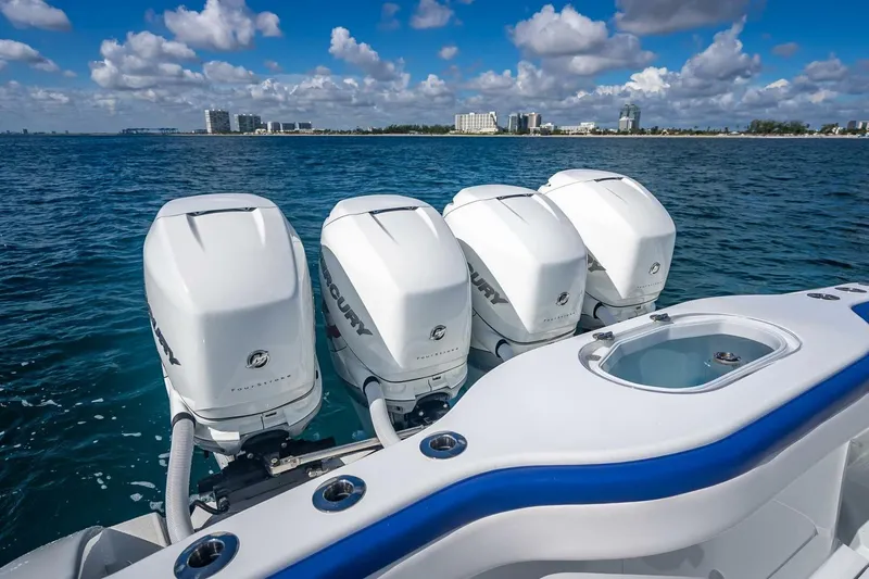  Yacht Photos Pics 2023 Yellowfin 39 Offshore boat with four Mercury outboard engines on open water.