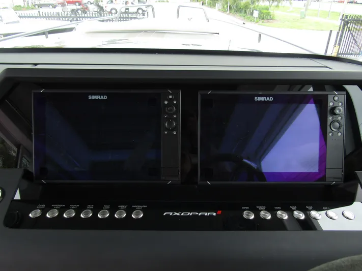  Yacht Photos Pics 2024 Axopar 37XC CROSS CABIN dashboard with dual Simrad displays.