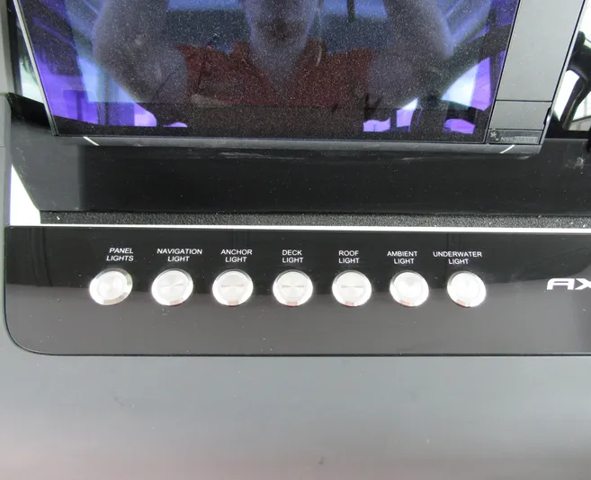  Yacht Photos Pics Control panel of 2024 Axopar 37XC CROSS CABIN with various light switches.