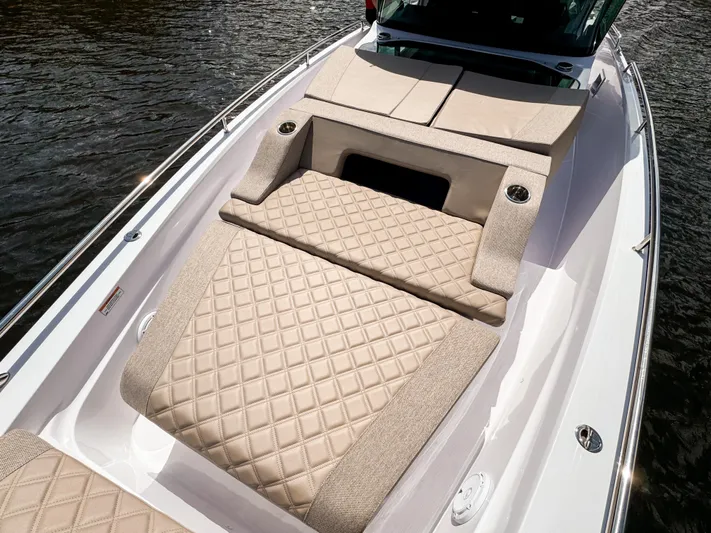  Yacht Photos Pics 2024 Axopar 37XC CROSS CABIN with luxurious beige diamond-stitched seating on deck.