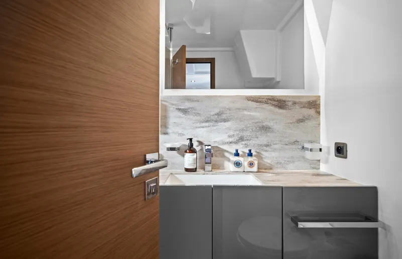  Yacht Photos Pics Modern bathroom in 2024 Prestige M48 yacht with sleek design and elegant fixtures.