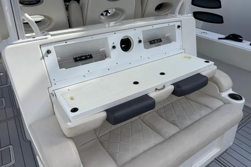 Destroyer Yacht Photos Pics 2018 HCB 39 Speciale boat interior with seating and storage compartments.