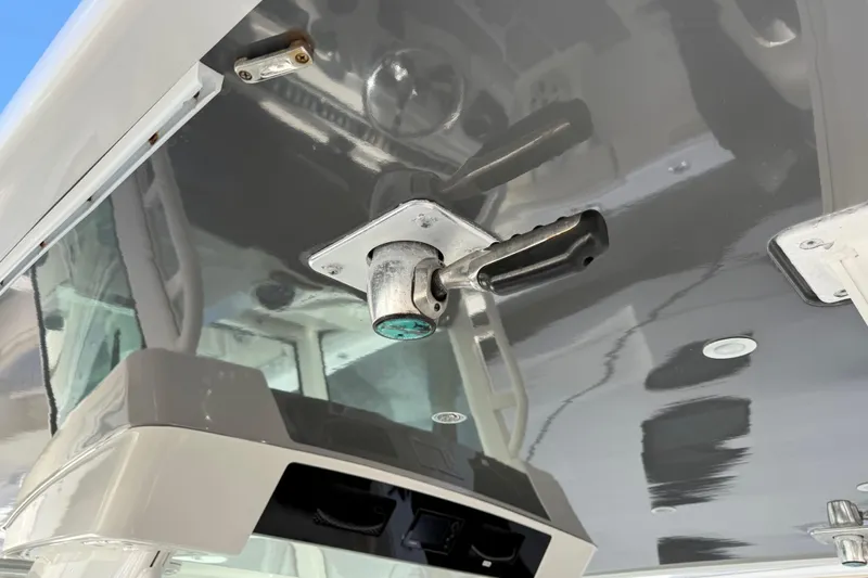 Destroyer Yacht Photos Pics 2018 HCB 39 Speciale boat interior with mounted handle and reflective surfaces.