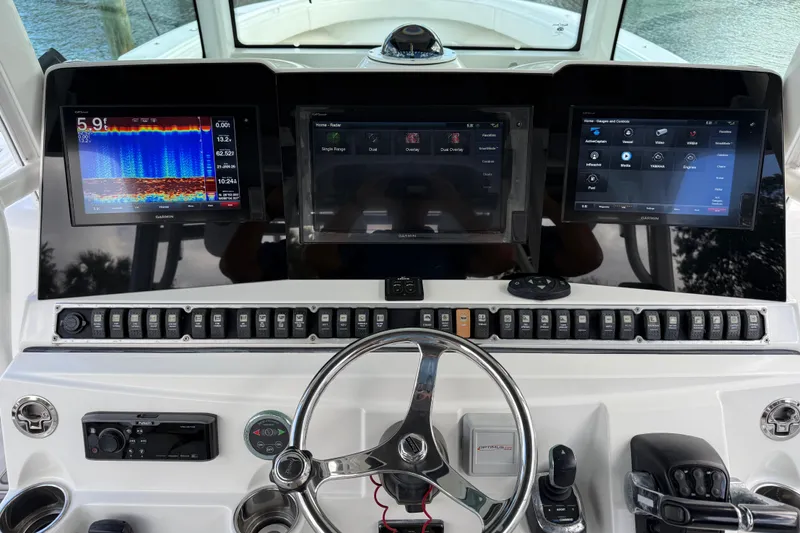 Destroyer Yacht Photos Pics 2018 HCB 39 Speciale boat dashboard with advanced navigation displays and controls.