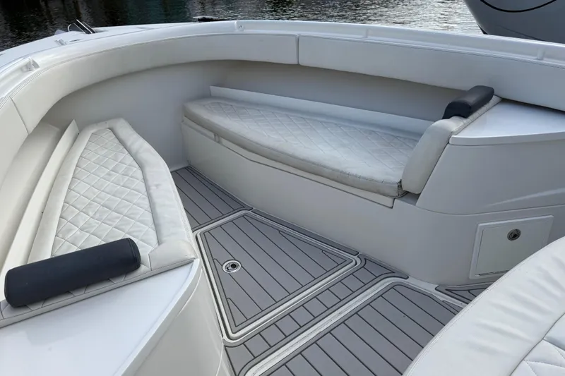 Destroyer Yacht Photos Pics Interior of 2018 HCB 39 Speciale boat with white cushioned seating.