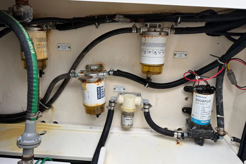 Destroyer Yacht Photos Pics Engine compartment of 2018 HCB 39 Speciale with fuel filters and hoses.