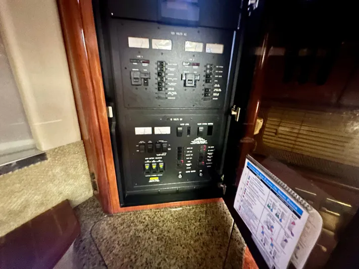  Yacht Photos Pics Electrical panel inside 2005 Sea Ray 420 Sundancer yacht, featuring switches and controls.