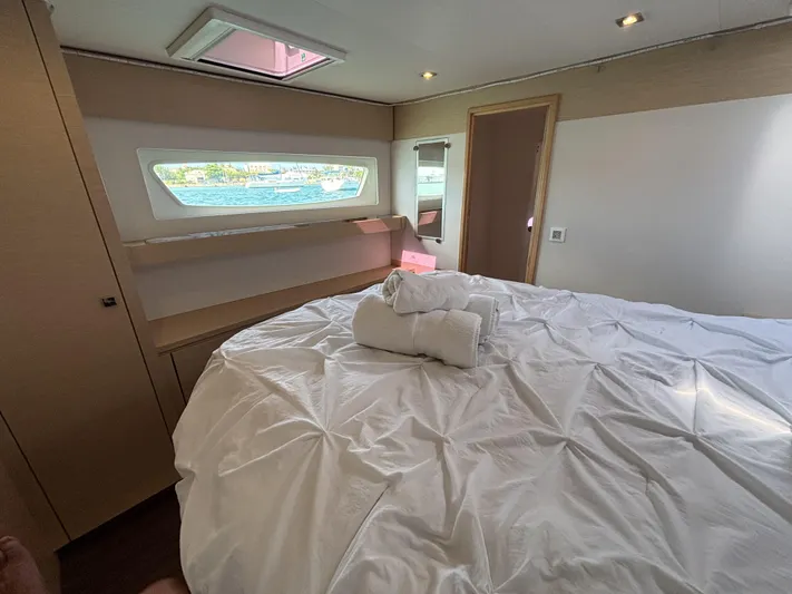 Adventure For Seven Yacht Photos Pics Luxurious bedroom interior of 2017 Fountaine Pajot Ipanema 58 yacht with ocean view.