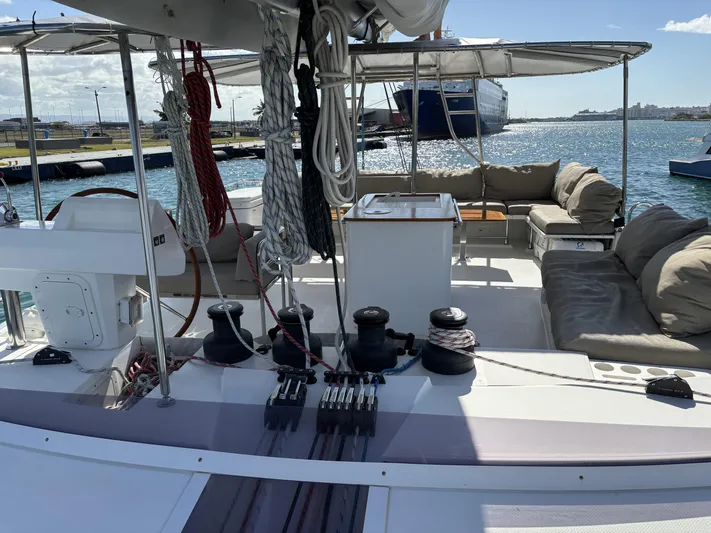 Adventure For Seven Yacht Photos Pics 2017 Fountaine Pajot Ipanema 58 catamaran deck with seating and ocean view.