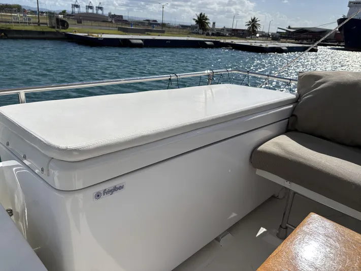 Adventure For Seven Yacht Photos Pics 2017 Fountaine Pajot Ipanema 58 yacht deck with seating and storage box.