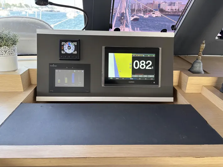 Adventure For Seven Yacht Photos Pics Navigation dashboard of 2017 Fountaine Pajot Ipanema 58 catamaran with digital displays.