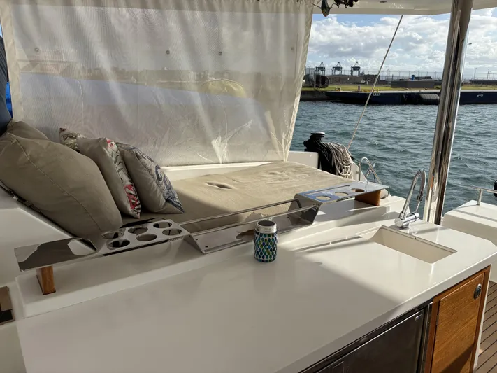 Adventure For Seven Yacht Photos Pics Luxurious 2017 Fountaine Pajot Ipanema 58 yacht interior with comfortable seating and ocean view.