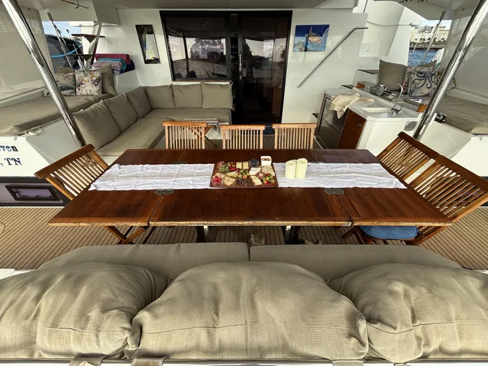 Adventure For Seven Yacht Photos Pics Luxurious 2017 Fountaine Pajot Ipanema 58 yacht with elegant outdoor dining area.