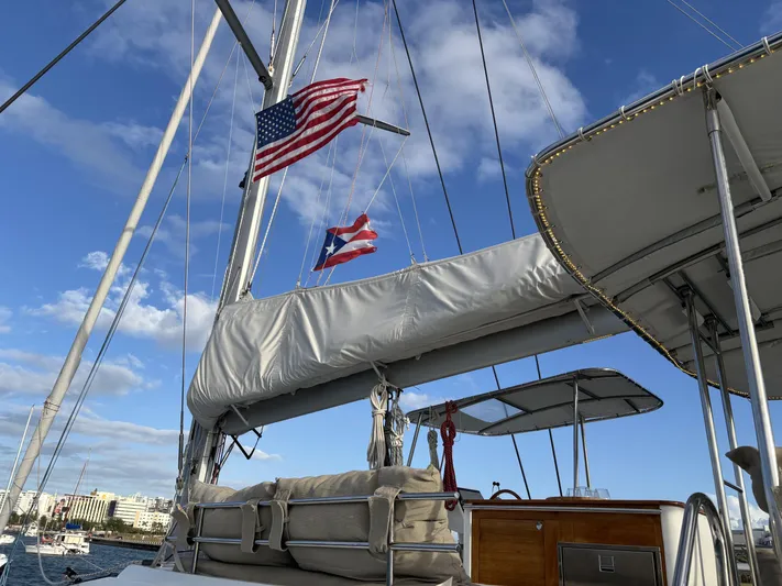 Adventure For Seven Yacht Photos Pics 2017 Fountaine Pajot Ipanema 58 sailboat with American and Puerto Rican flags.